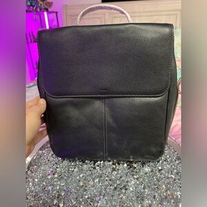 Fossil Black Leather 2 toned back pack. Never wore in original packaging.Vintage
